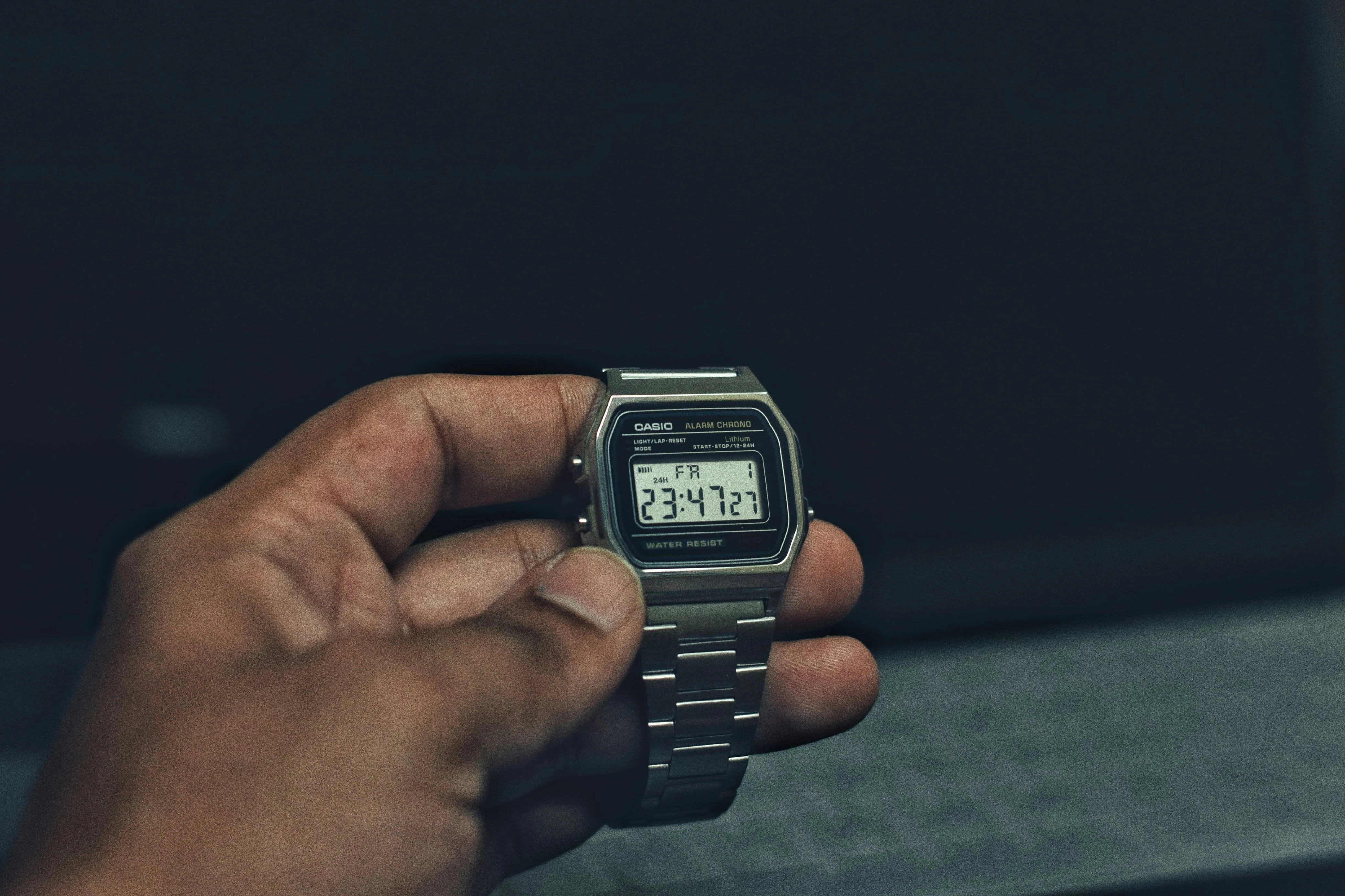 Hand holding a Casio Watch